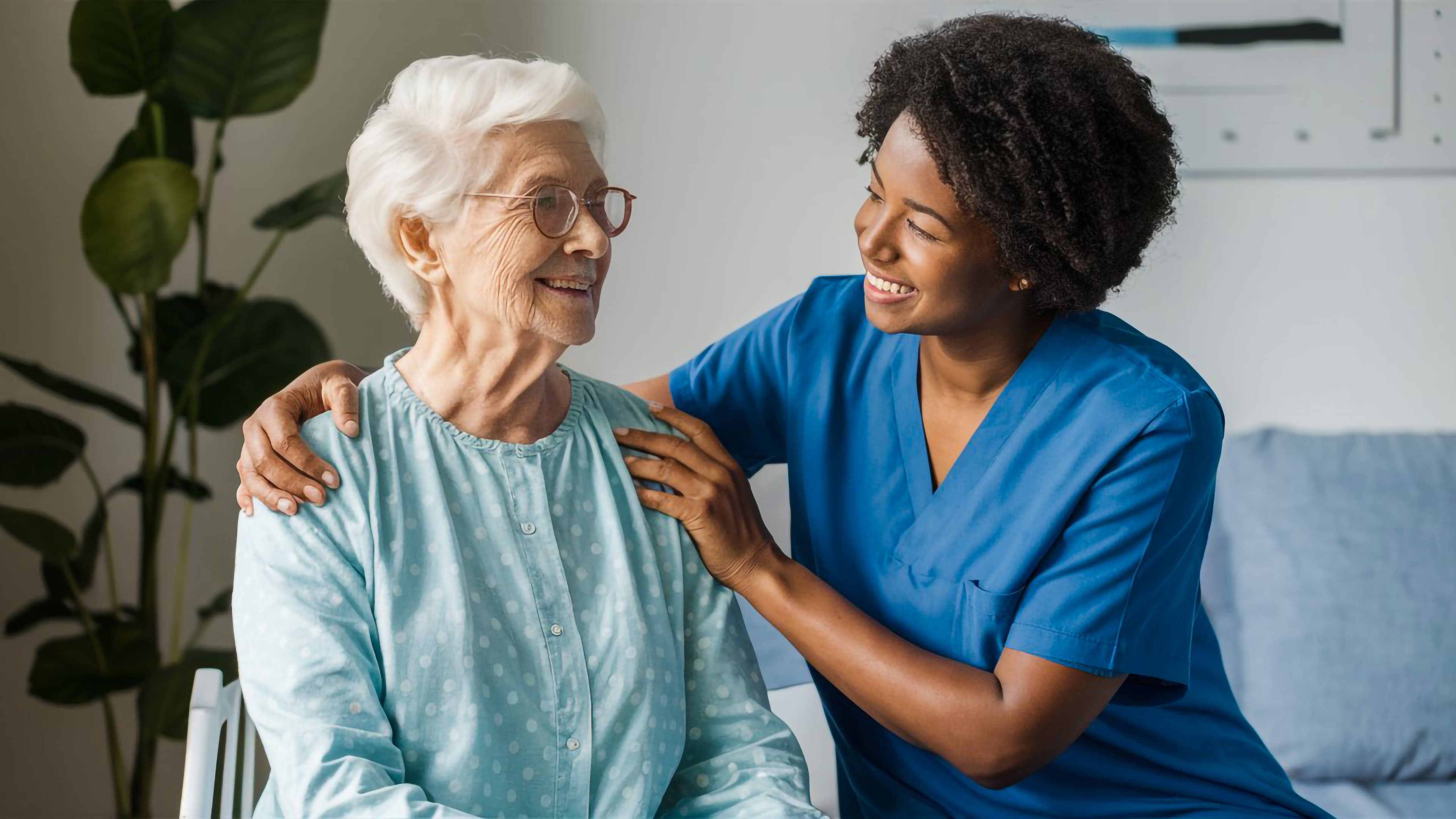 Agape Comfort Care — caregiver and senior client sharing a warm moment